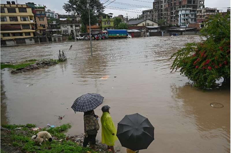 Areas of Kathmandu were flooded after the Bagmati River overflowed. Floods and landslides have killed at least 59 people across Nepal