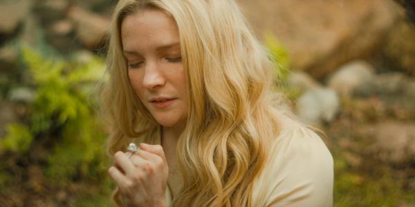 Galadriel (Morfydd Clark) retrieves her Ring of Power in The Lord of the Rings: The Rings of Power Season 2 Episode 8