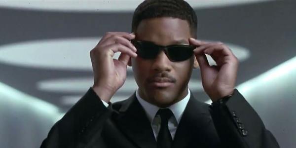 Will Smith as James Darrell Edwards III / Agent J putting on his sunglasses in Men In Black