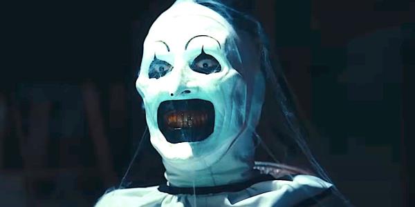 David Howard Thornton's Art the Clown smiles in Terrifier 3 trailer