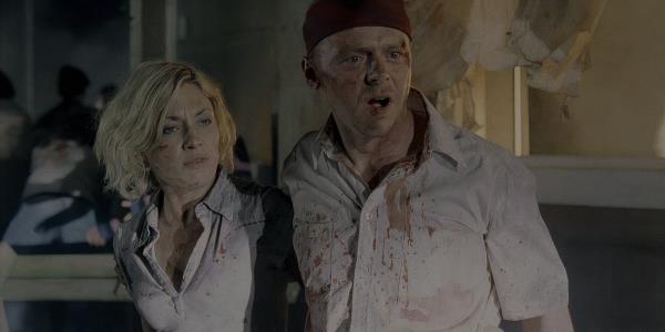 Simon Pegg as Shaun and Kate Ashfield as Liz looking shocked in Shaun of the Dead