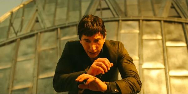 Adam Driver as Cesar Catilina looking panicked on a rooftop in Megalopolis