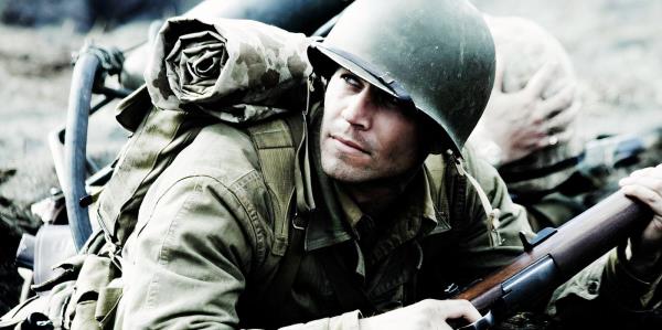 Ryan Phillippe looking over his shoulder as John Doc Bradley in Flags of Our Fathers