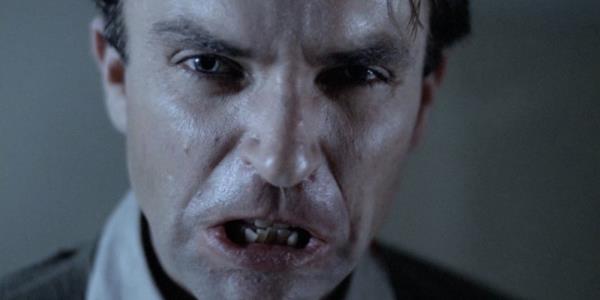 Mark (Sam Neill) looks upset in Possession