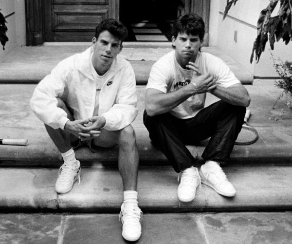 Lyle and Erik Menendez on the steps of the family home