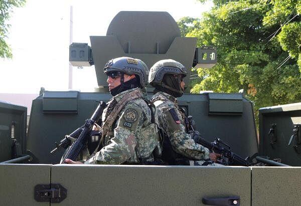 Soldiers patrol a neighbourhood after Mexico's military deployed additio<em></em>nal troops to the violence-stricken state of Sinaloa over the weekend, in Culiacan, Mexico.