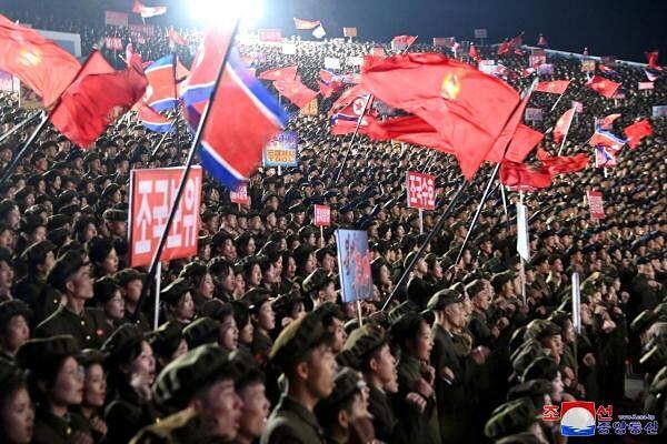 Young people, including students and youth league officials, participate in an army enlistment event at an undisclosed location in North Korea.