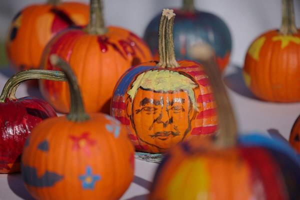 A pumpkin is painted with the face of Republican presidential nominee and former U.S. President Do<em></em>nald Trump at the Rod of Iron Freedom Festival, which the organizers call "the largest open carry rally in America," in Greeley, Pennsylvania.