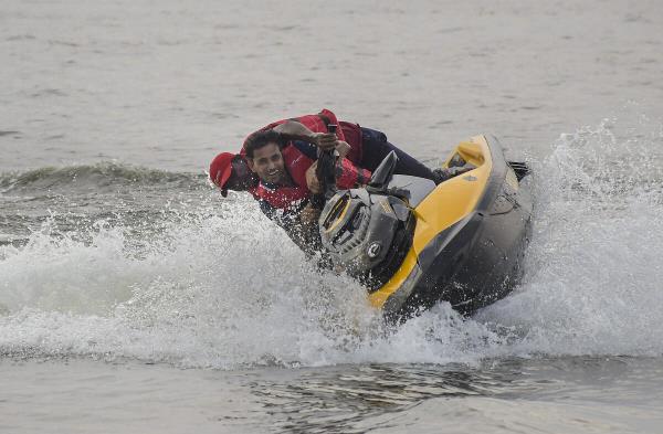 Participants take part in the Aqua Sports organised by the Maharashtra Tourism Development Corporation (MTDC), at Futula Lake in Nagpur.