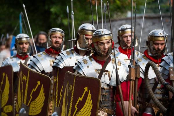 Roman soldiers marching during the Rímske Hry historical festival in Rusovce.