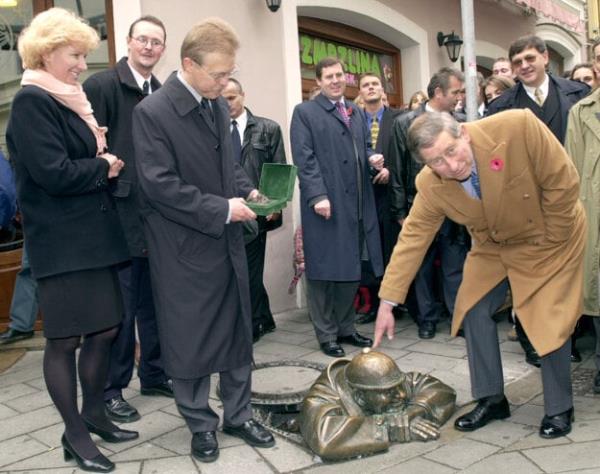 Prince Charles poses with ?umil in Bratislava in November 2000.