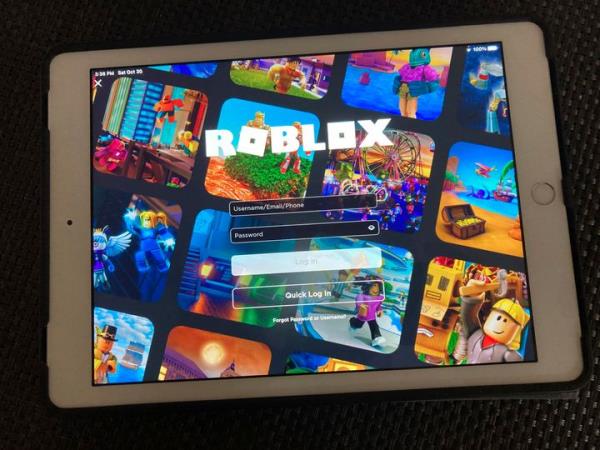 A login page for the gaming platform Roblox is seen on a tablet, Oct. 30, 2021, in New York.