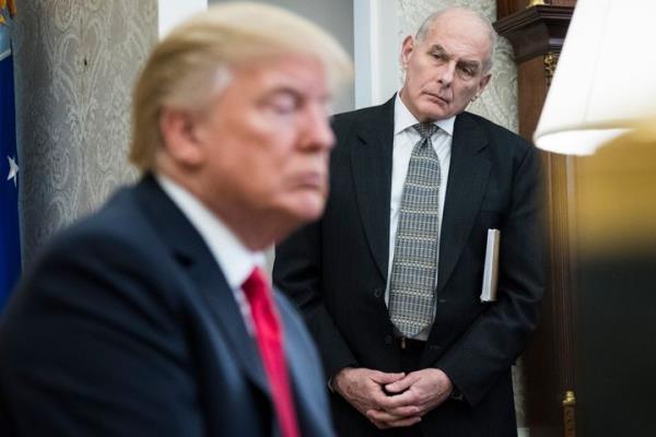 In 2018, White House Chief of Staff John Kelly watches as then-President Do<em></em>nald Trump speaks during a meeting with North Korean defectors in the Oval Office.