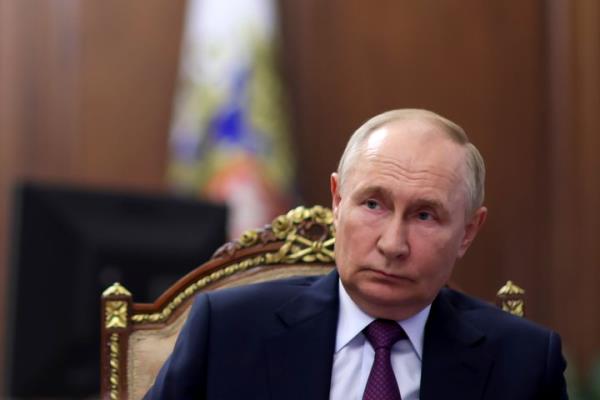 Russian President Vladimir Putin listens to Russian State Atomic Energy Corporation Rosatom Director General Alexei Likhachev during their meeting at the Kremlin in Moscow, Russia, Tuesday, Oct. 15, 2024. (Mikhail Metzel, Sputnik, Kremlin Pool Photo via AP)