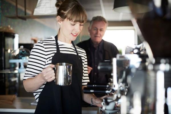 stock of woman holding coffee