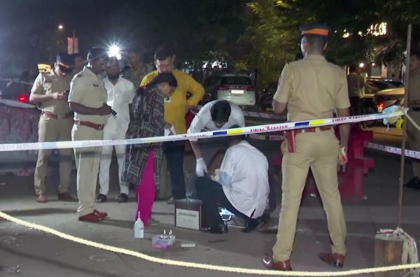 A forensic team investigates the site wher<em></em>e former Maharashtra minister Baba Siddique was shot dead by three assailants, in Mumbai, Saturday night, Oct 12, 2024.