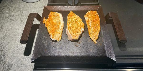 Cooking chicken on griddle