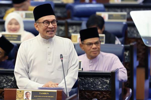 Anwar Ibrahim tabling the 2025 Budget. Photo by Bernama 