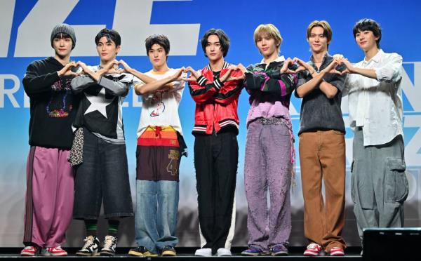 K-pop boy group 'RIIZE' members (L-R) Sungchan, Seunghan, Sohee, Wonbin, Shotaro, Eunseok and Anton (Photo by Jung Yeon-je / AFP) 