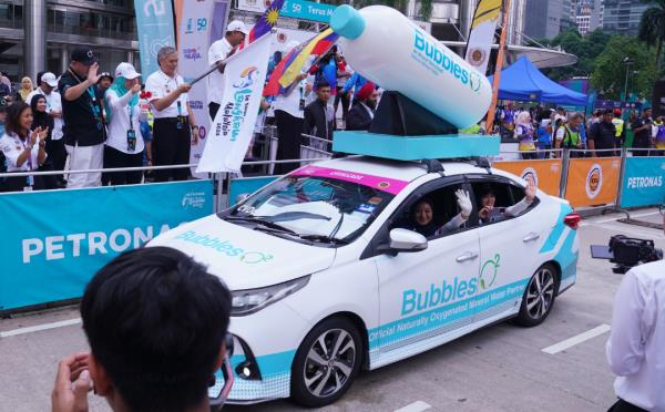 The Cavalcade Bubbles O2 car was seen participating in the flag-off session of the fifth stage of the Le Tour de Langkawi 2024, from Kuala Lumpur to Melaka, on Thursday. - Photo by MOHD HALIM ABDUL WAHIB