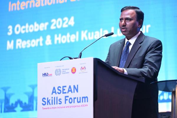 ILO's Srinivas B Reddy delivering his speech at the ASEAN Skills Forum 2024. (Photo courtesy of HRD Corp)