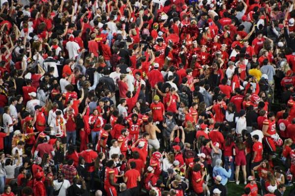 Oct 19, 2024: Maryland football fans celebrate on the field with players after the come from behind 29-28 victory over USC at SECU Stadium. (Kim Hairston/Staff)