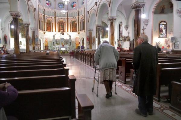 Parishio<em></em>ners attend mass at Saint Wenceslaus Catholic Church on Ashland Avenue in East Baltimore.