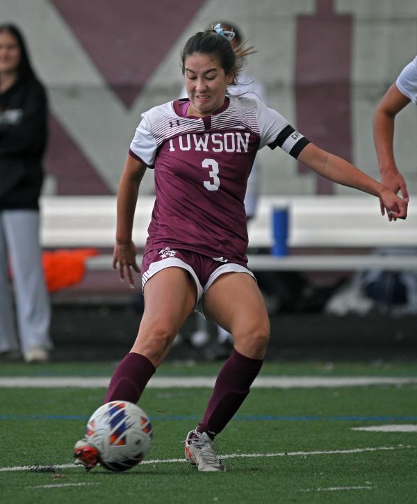 Towson's Koto Davis takes a shot against Eastern Tech in the first half of girls soccer game. (Kenneth K. Lam/Staff)