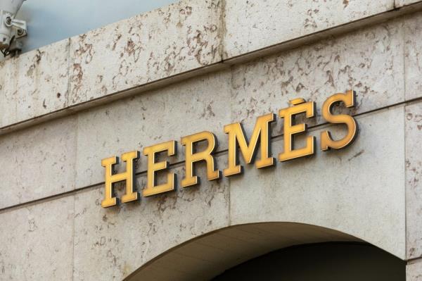 Hermes shop logo sign on a building in Lisbon, Portugal