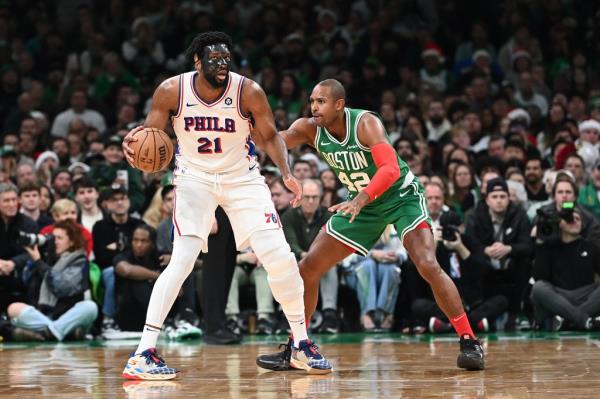 Philadelphia 76ers center Joel Embiid (21) dribbles against Boston Celtics center Al Horfor<em></em>d (42) during the second half at TD Garden. 