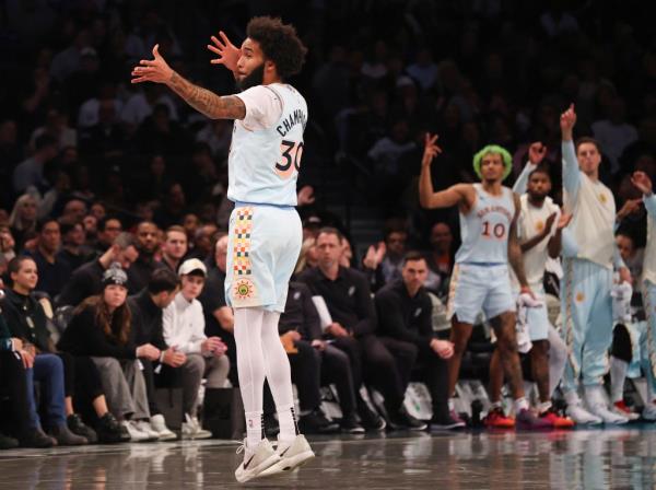 Julian Champagnie of the San Anto<em></em>nio Spurs reacts after hitting a 3-point shot 