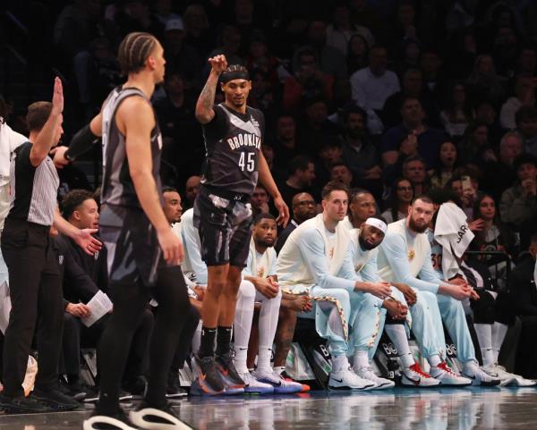 Keon Johnson of the Brooklyn Nets reacts after he hits a 3-point shot 