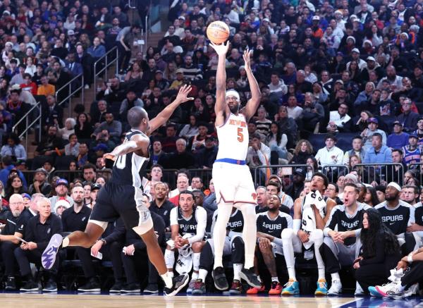 Knicks forward Precious Achiuwa #5 puts up a jump shot