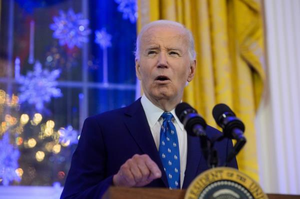 President Joe Biden speaking at a Hanukkah reception in the East Room of the White House