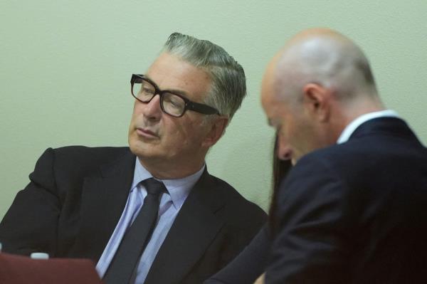 Alec Baldwin (L) attends his trial for involuntary manslaughter at Santa Fe County District Court in Santa Fe, New Mexico, on July 12, 2024.