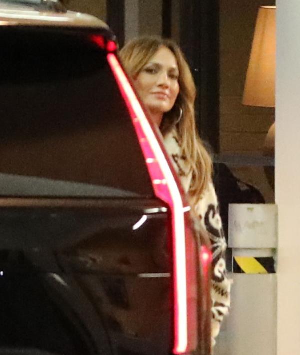 J.Lo smiles as she gets in her waiting vehicle at the valet stand at Soho House in West Hollywood, Calif.