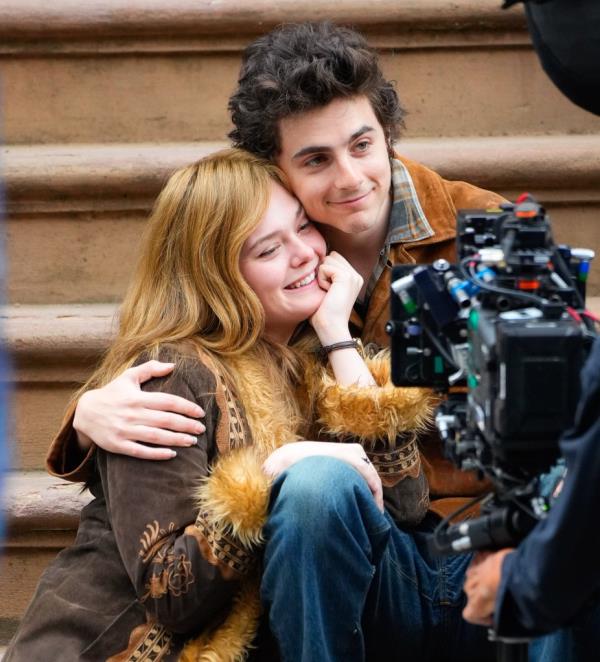 Elle Fanning and Timothee Chalamet are seen on location for 'A Complete Unknown' on June 11, 2024 in Hoboken, New Jersey.