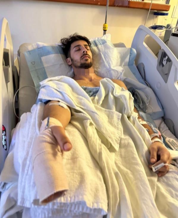 Dilaver Berk, 25, in the hospital after getting attacked.