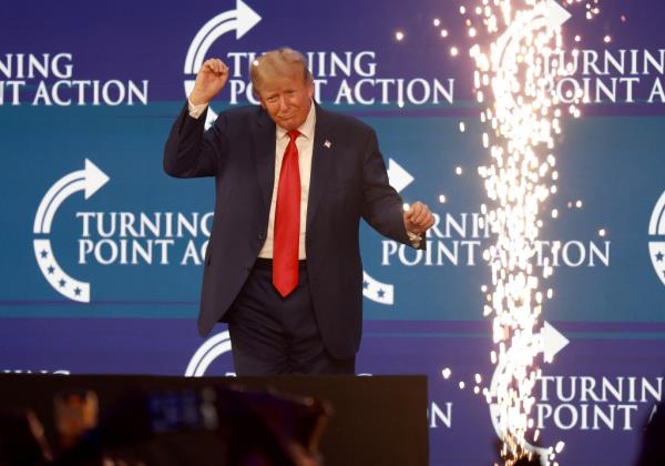 President-elect Do<em></em>nald Trump briefly dances after he spoke at the Turning Point Action conference