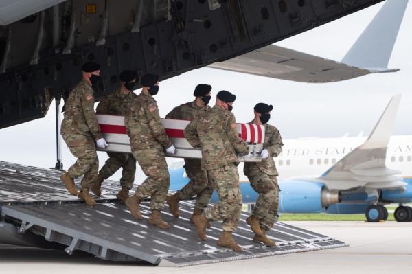 US President Joe Biden and First Lady Jill Biden attending the dignified transfer of the remains of Army Staff Sgt. Ryan C. Knauss at Dover Air Force ba<em></em>se