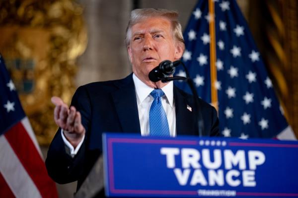 President-elect Do<em></em>nald Trump speaking at a news co<em></em>nference at Mar-a-Lago resort in Palm Beach, Florida