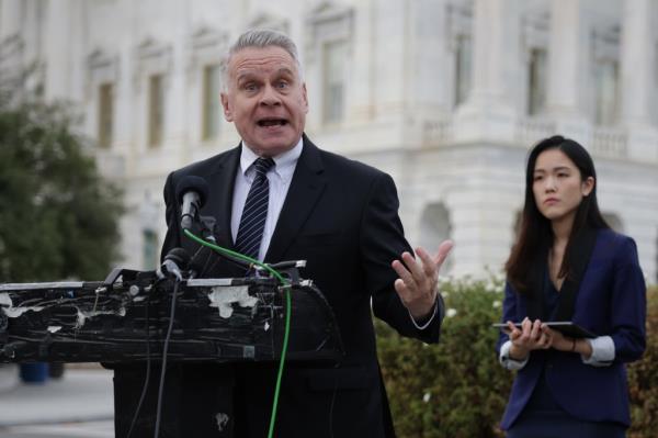 U.S. Rep. Chris Smith (R-NJ) speaks as Policy and Advocacy Coordinator of the Committee for Freedom in Hong Kong (CFHK) Foundation Frances Hui listens during a news co<em></em>nference in respo<em></em>nse of sentencing ruling in the Hong Kong 47 case November 19, 2024.