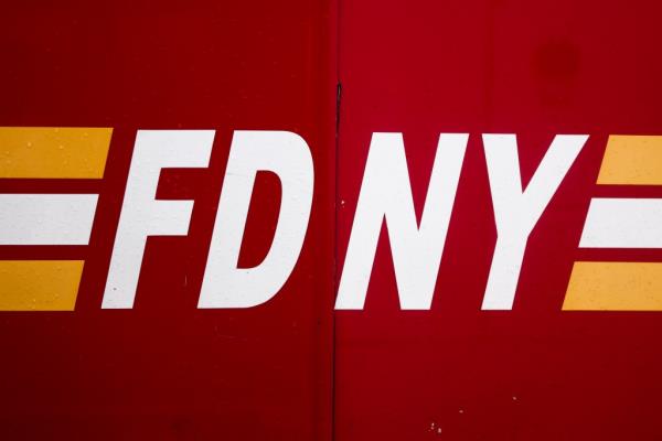 FDNY car with the logo of the Fire Department of the City of New York