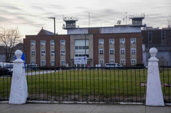 The sun sets behind Indiana State Prison