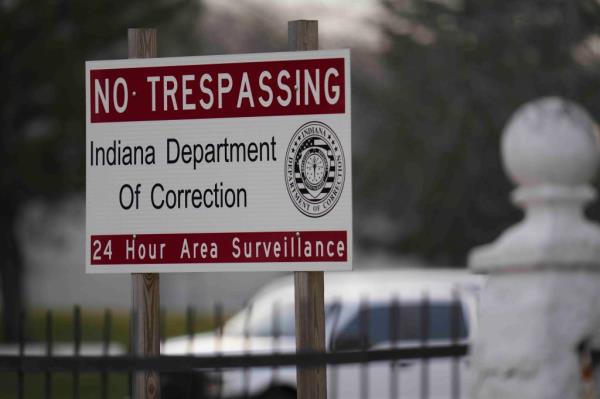 A sign is posted outside of Indiana State Prison.