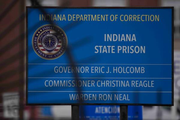 A sign is posted outside of Indiana State Prison.