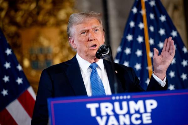 President-elect Do<em></em>nald Trump speaks at a news co<em></em>nference at Trump's Mar-a-Lago resort on December 16, 2024 in Palm Beach, Florida.