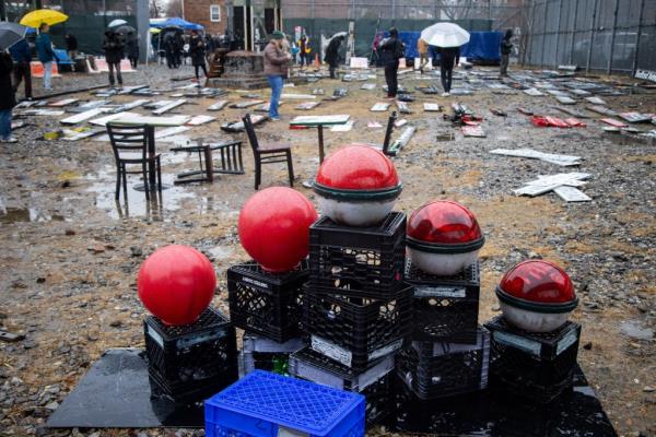 Subway stop globes were among the many items up for grabs at the MTA's sale in Brooklyn on Monday