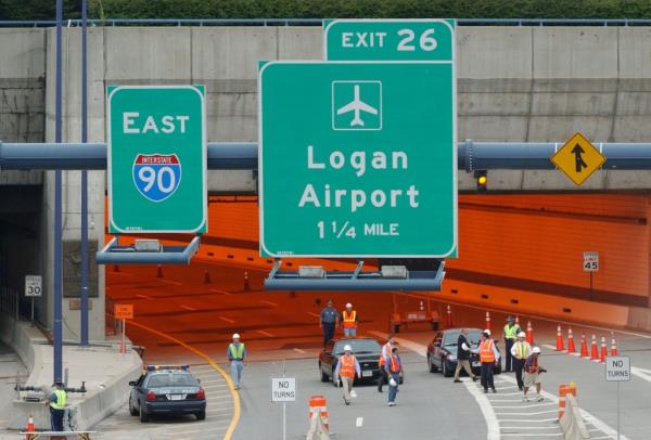 Mitt Romney walking out of the Ted Williams Tunnel in Boston after touring the Big Dig Ramp A, August 4, 2006